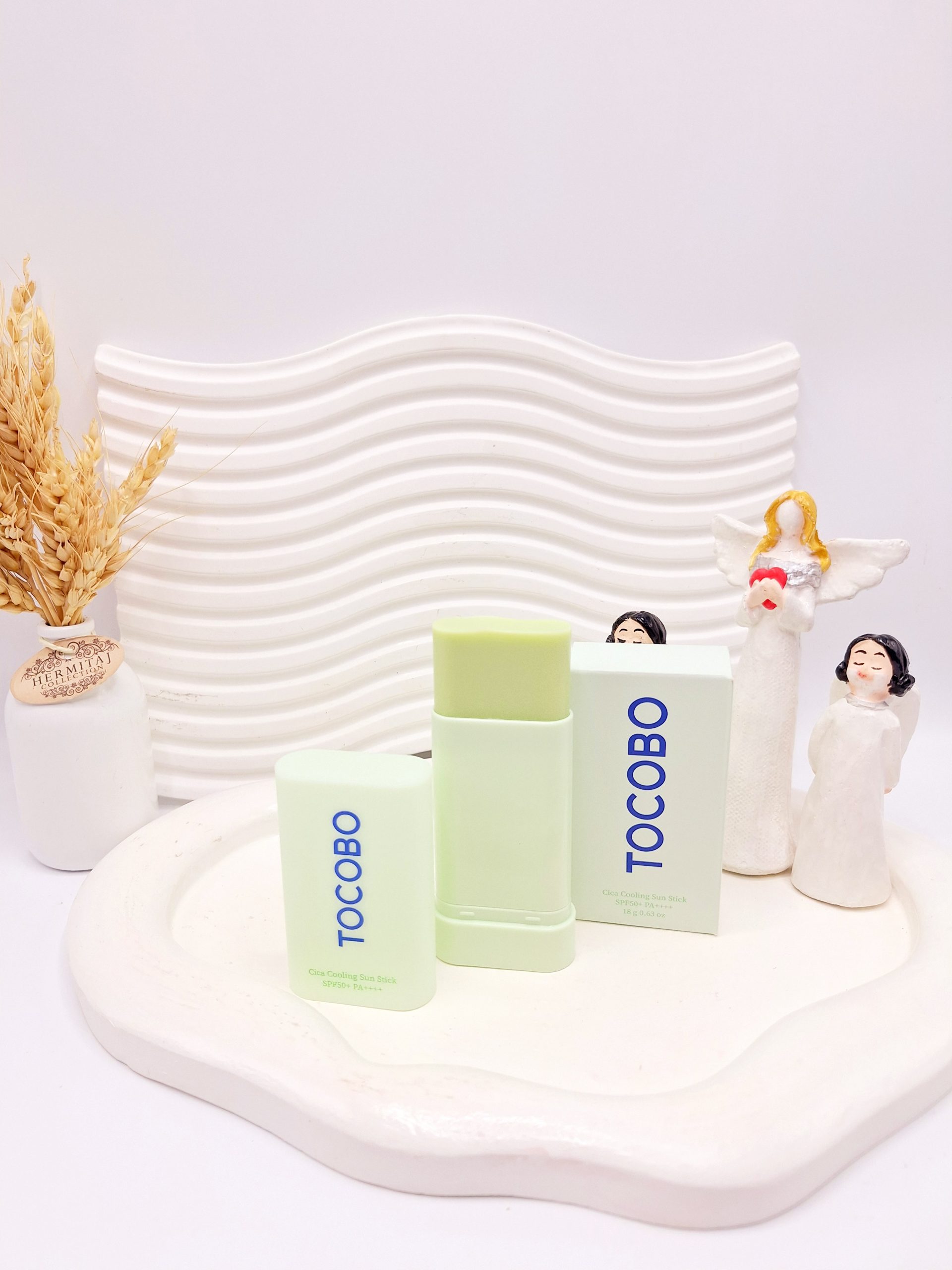 ضد آفتاب استیکی توکوبو مدل تسکین دهنده و خنک کننده حجم 18 گرم مسترکپی کد 0454