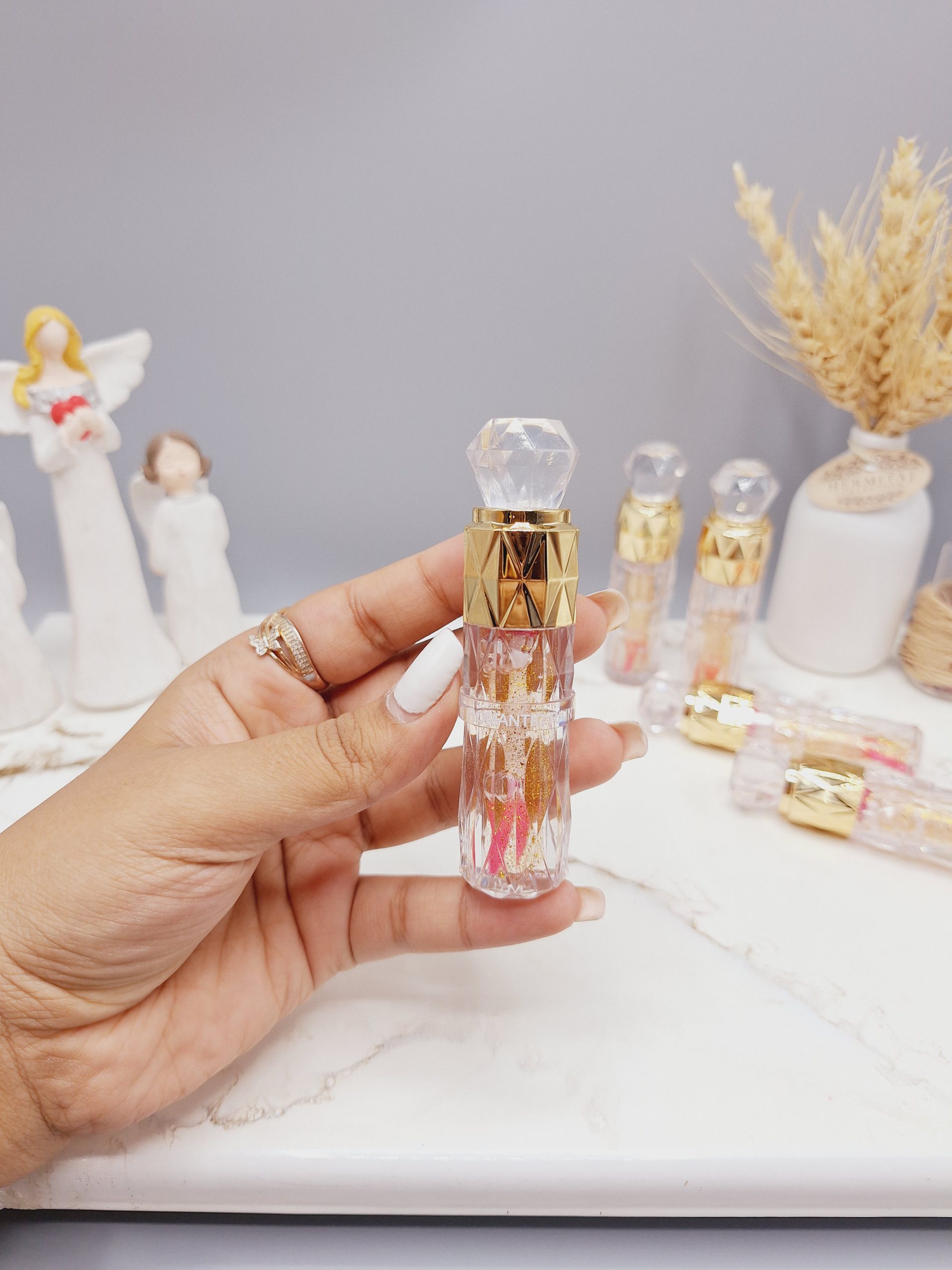 لیپ گلاس شاین دار طرح سر الماسی برند ROMANTIC RAIN کد NO:6424