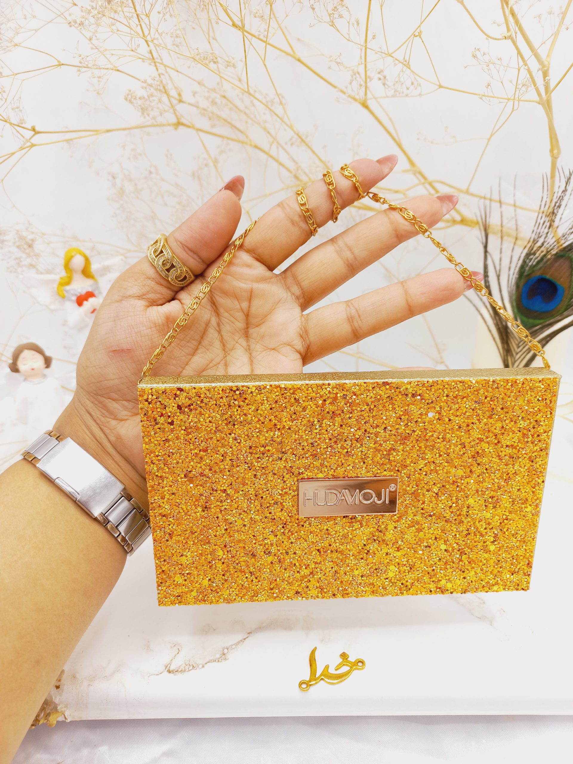 پالت سایه 15 رنگ هدا موجی HUDA MOJI طرح کیف زنجیره ای (طلایی) کد ES066