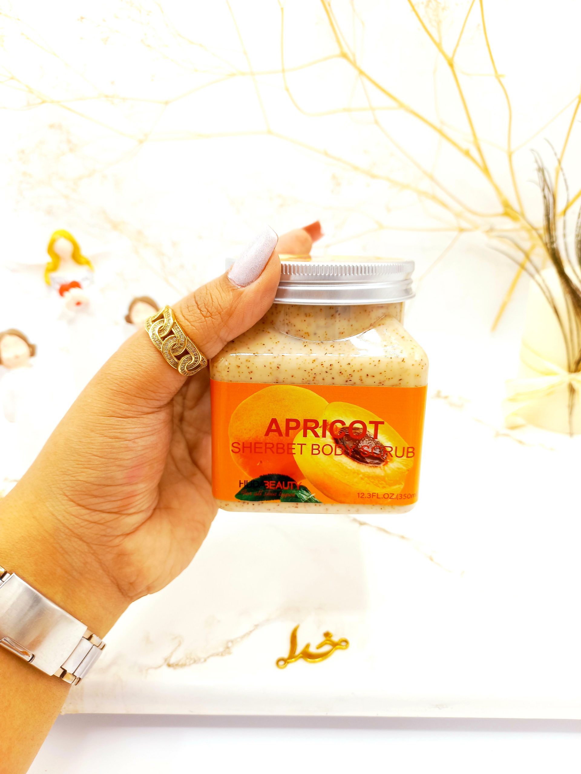 اسکراب شنی بدن کاسه ای هلو هدا بیوتی 320میل HUDABEAUTY