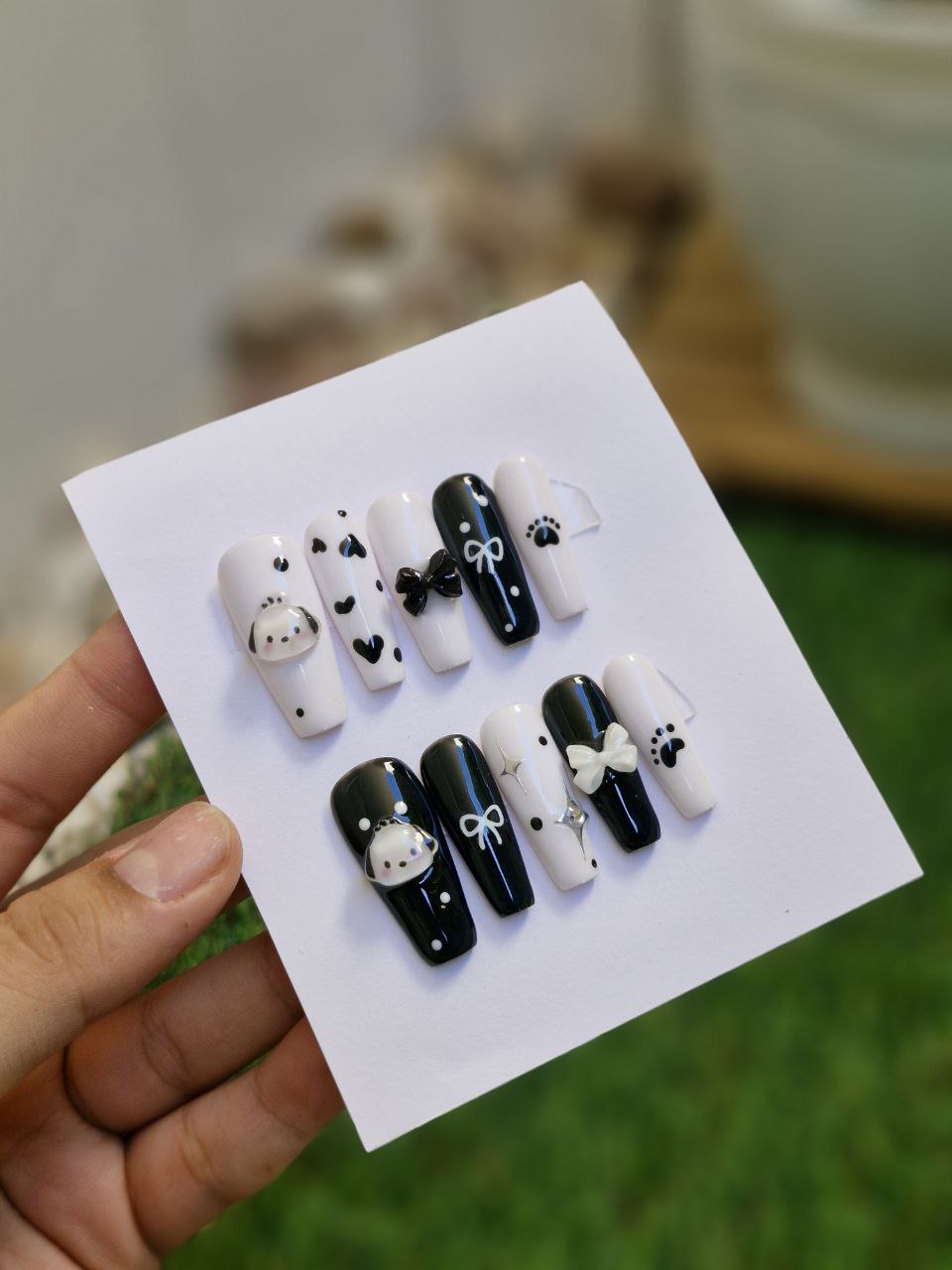ناخن مصنوعی با مواد کاشت طرح عروسک برجسته سفید مشکی (به همراه پک اختصاصی)