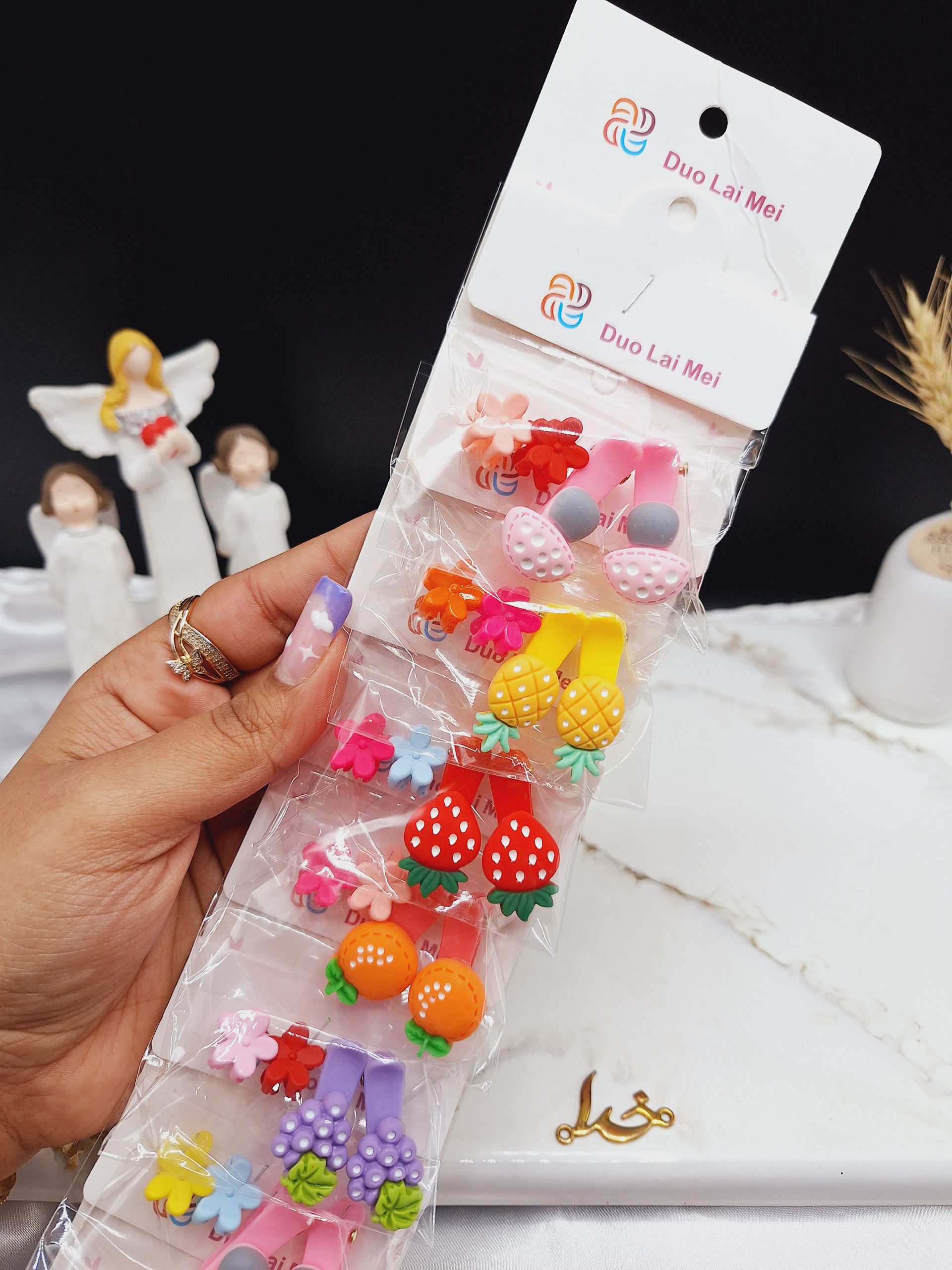 پک 10 عددی گیره مو دخترانه طرح گل و میوه