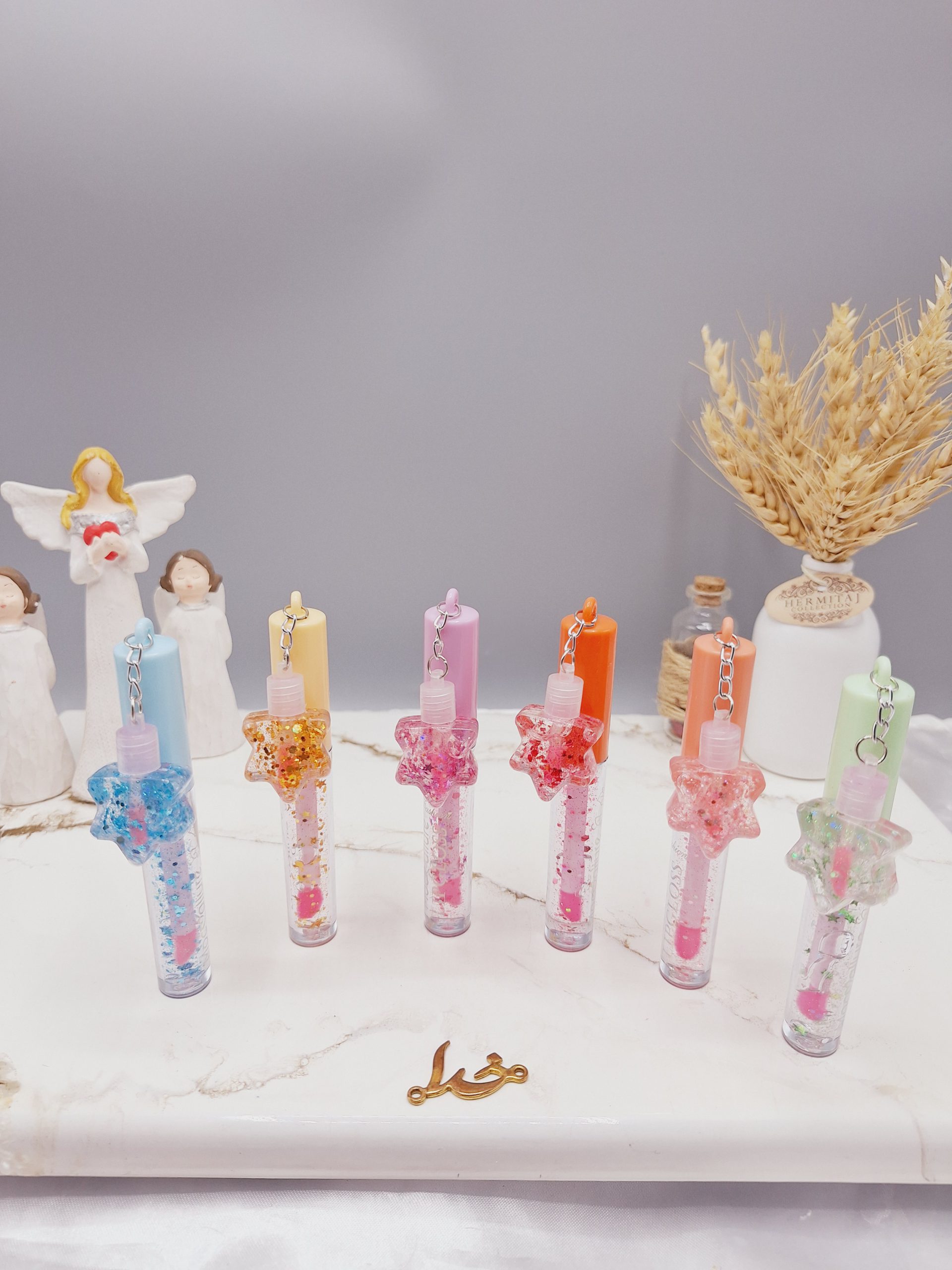 ست ۲عددی لیپ گلاس گلیتر دار طرح ستاره آویزدار برند موکالره کد Moc123