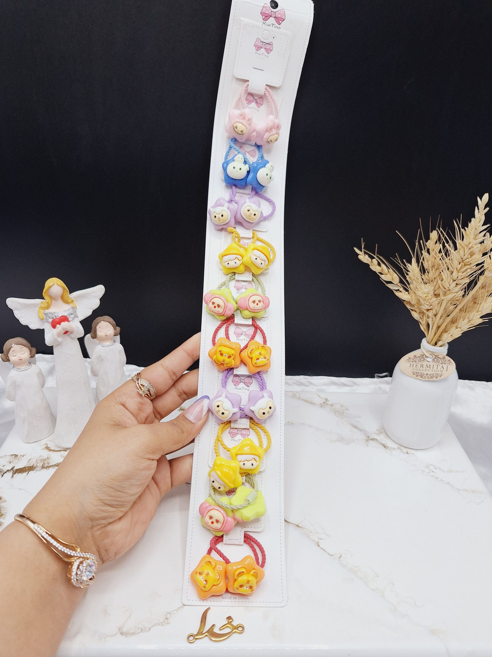 پک ده عددی کش مو ستاره ای رنگارنگ