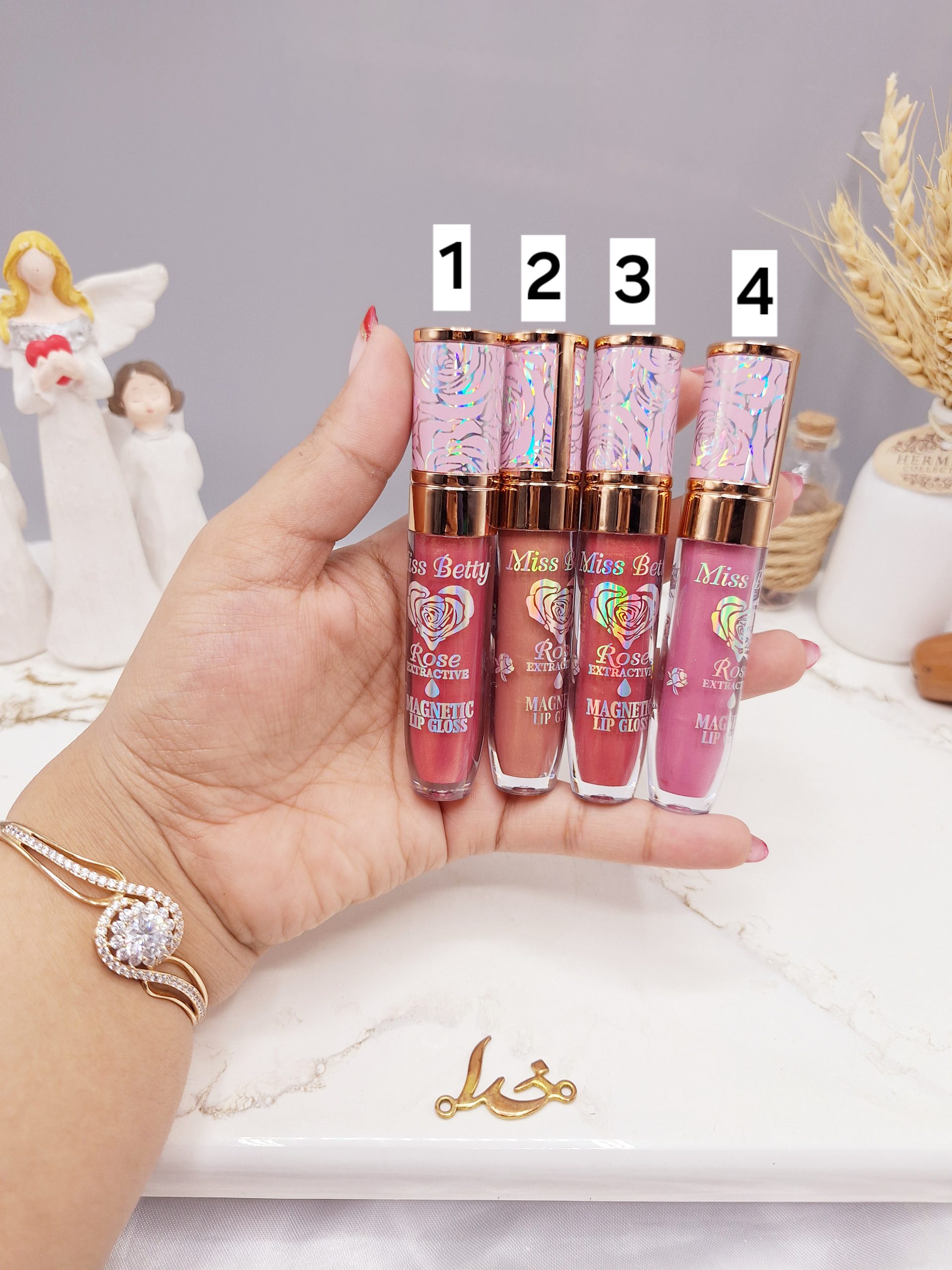 لیپ گلاس شاین دار طرح گل برند میس بتی Miss Betty کد L3305