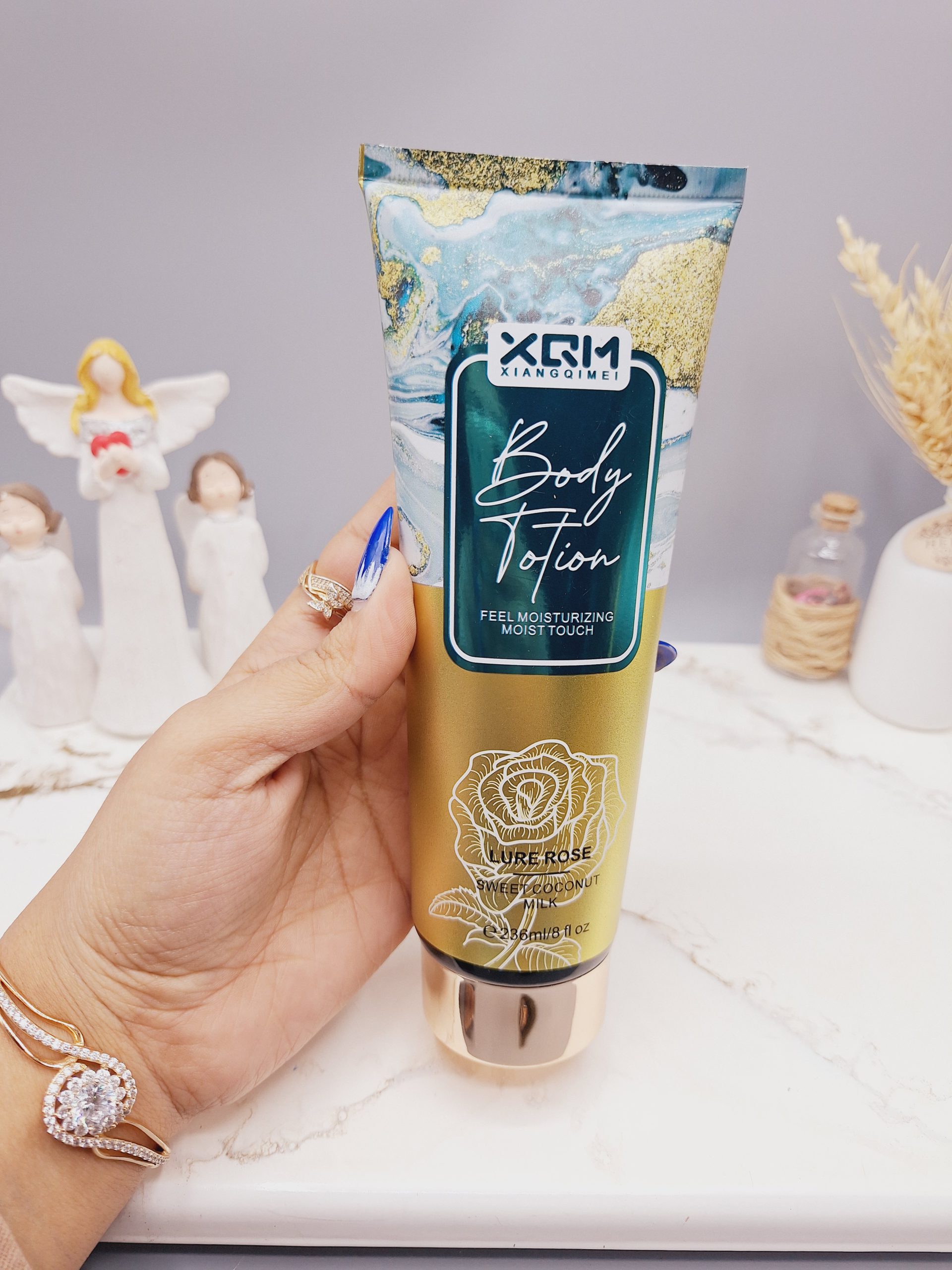 لوسیون بدن XQM حاوی ترکیبات مرطوب کننده و نرم کننده کد 0353