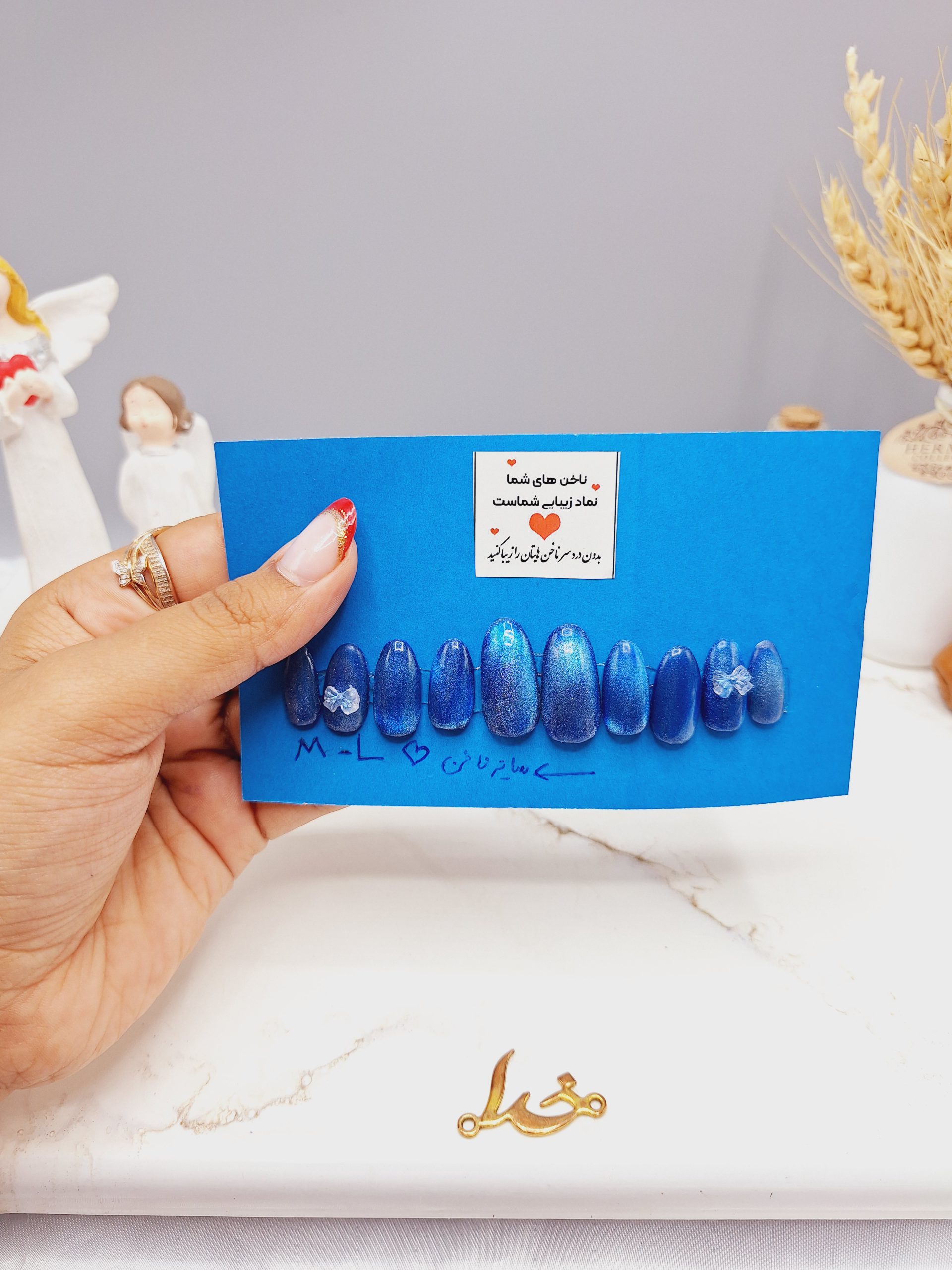 ناخن مصنوعی با مواد کاشت درجه 1 رنگ آبی کاربنی طرح پاپیون