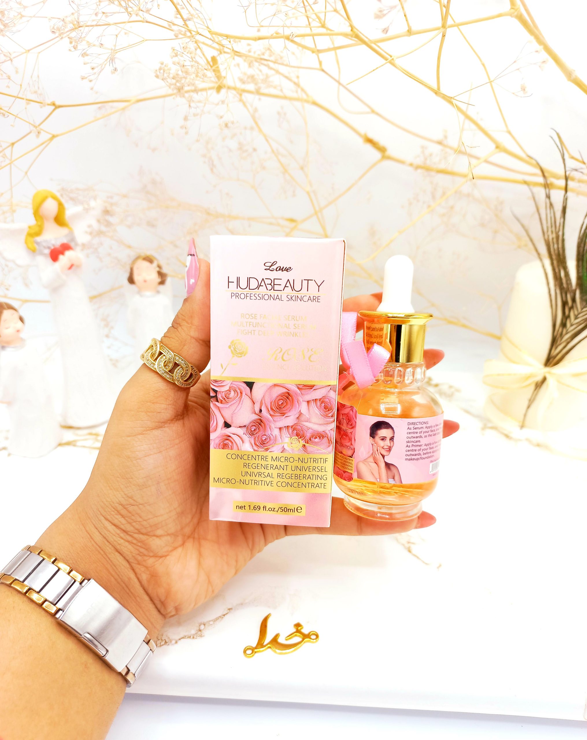 سرم و پرایمر مغذی جوان کننده صورت گل رز هدی بیوتی HUDABEAUTY کد HD826009