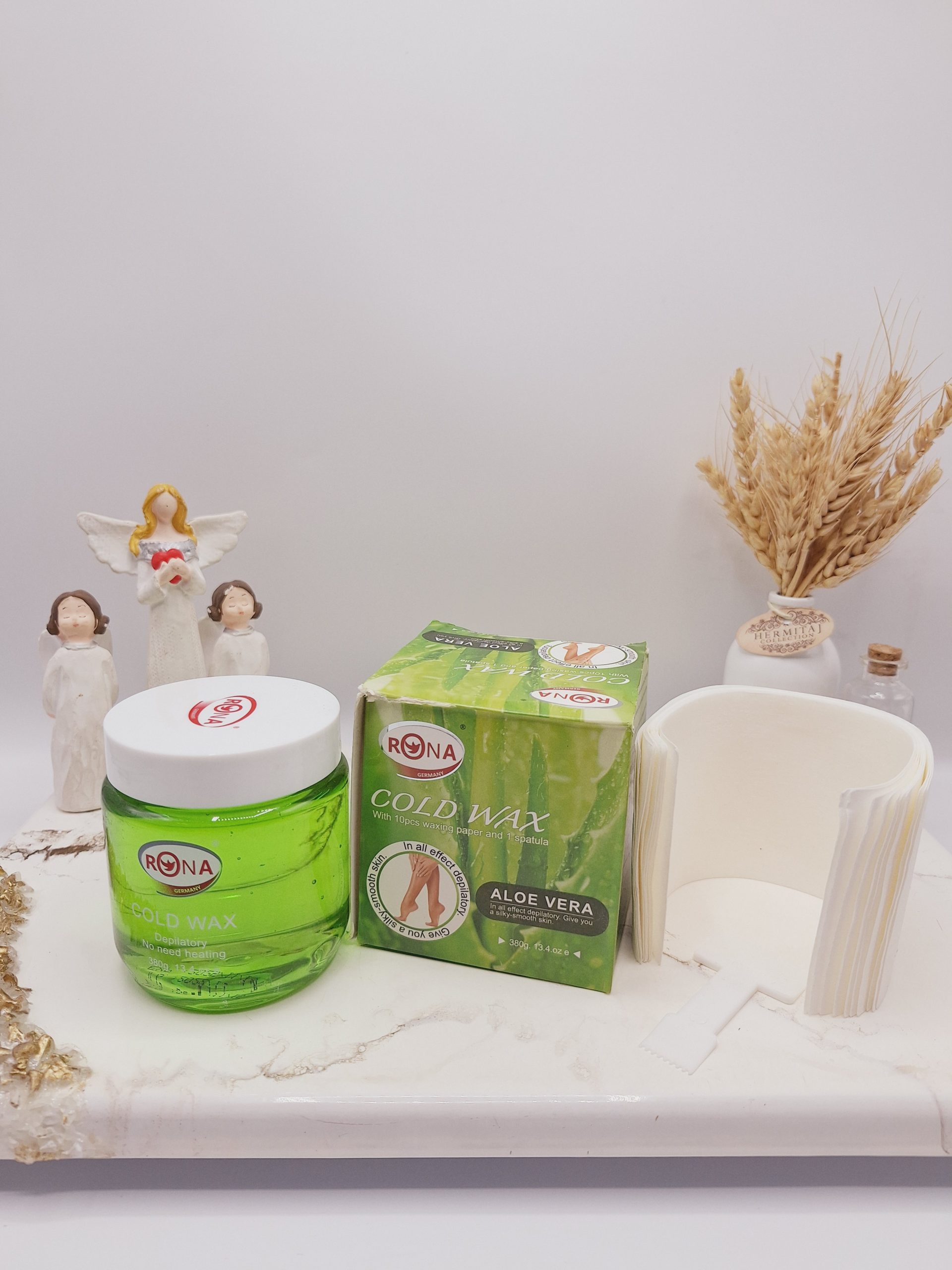 موم سرد با کاغذ اپیلاسیون همراه با کاردک رایحه آلوئه ورا برند RONA کد 3138