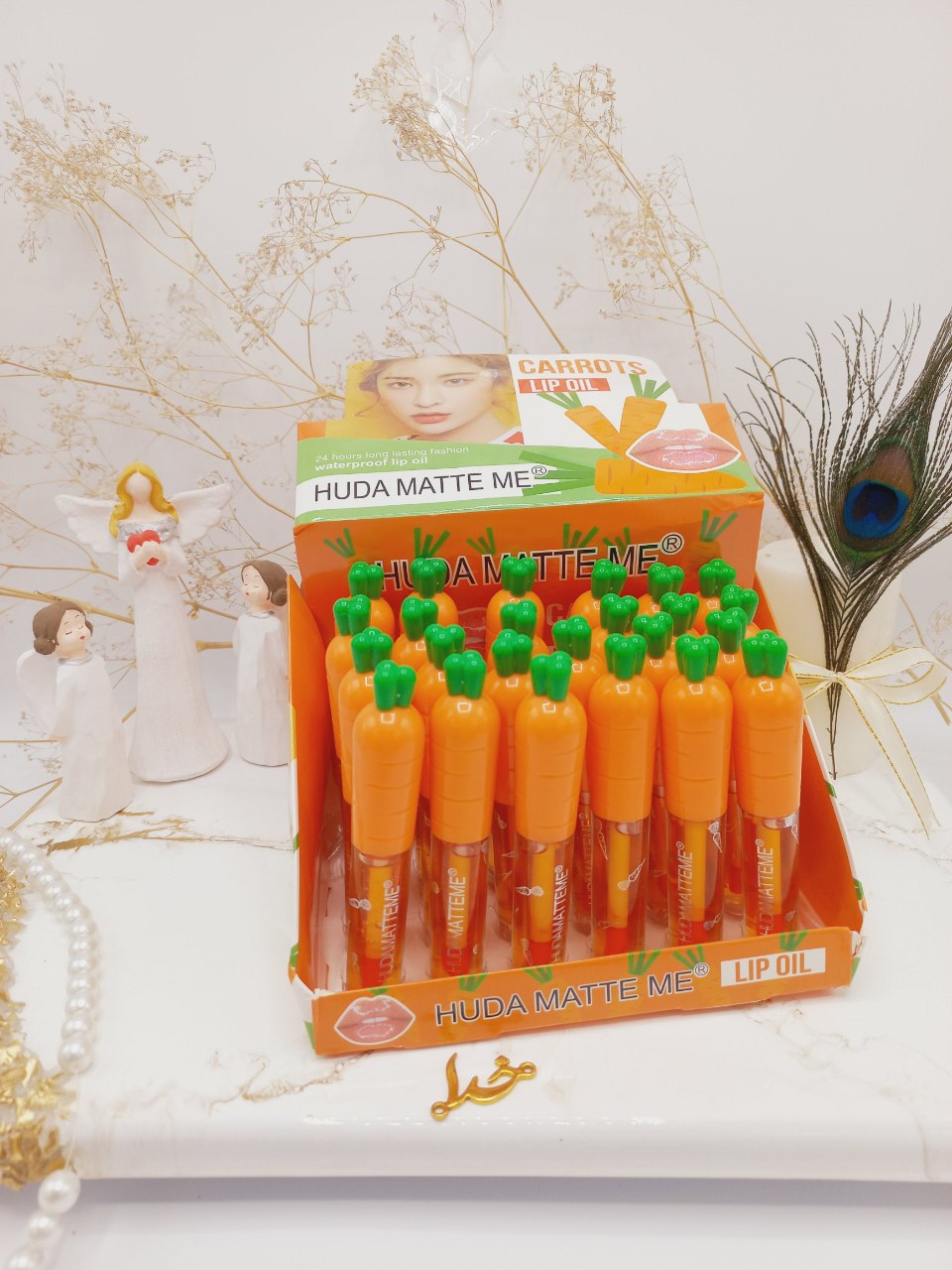 برق لب و لیپ گلاس درب هویج هدا مات می HUDA MATTE ME کد X050