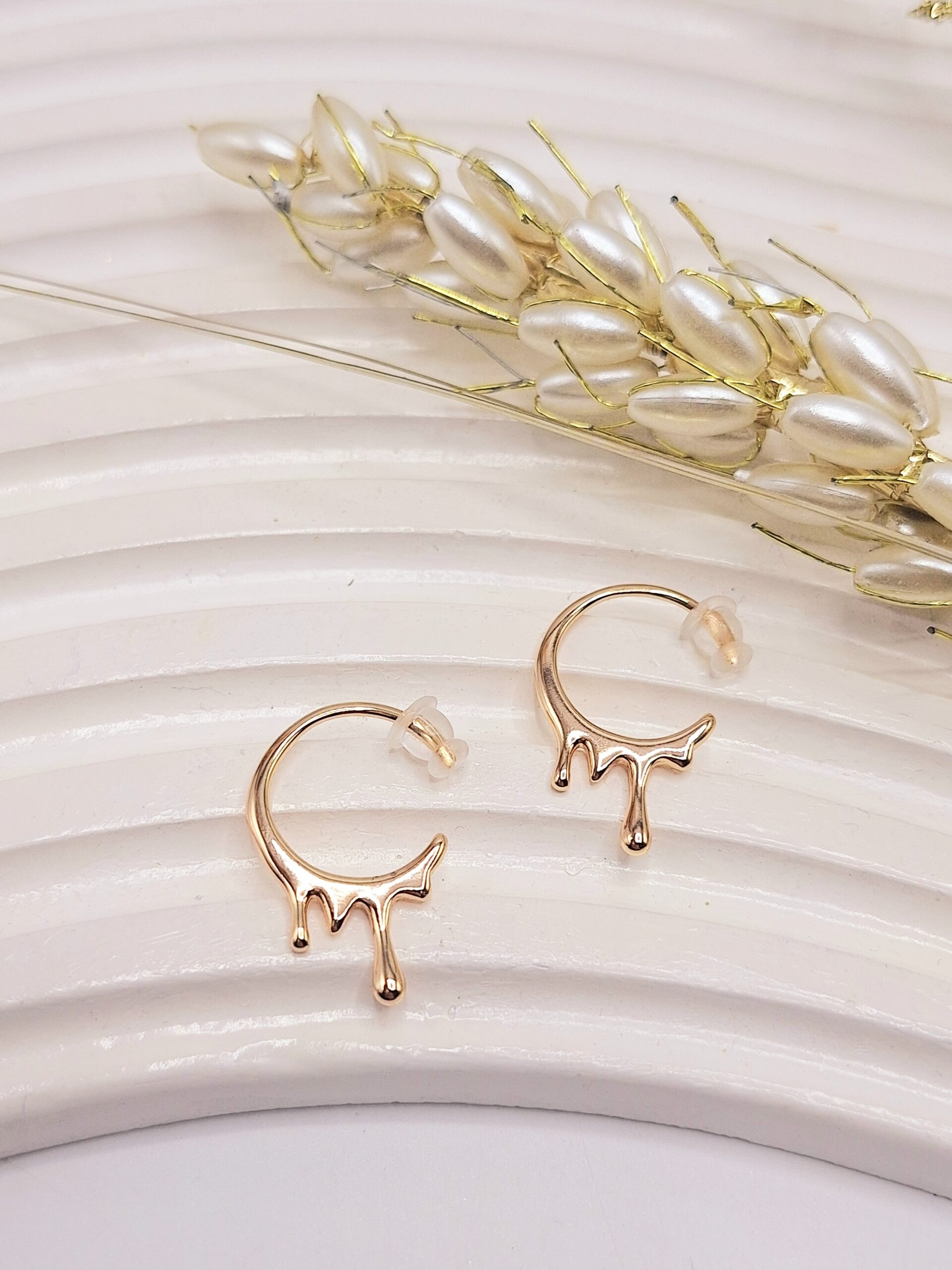 گوشواره ژوپینگ طرح قطره چکیده طلایی