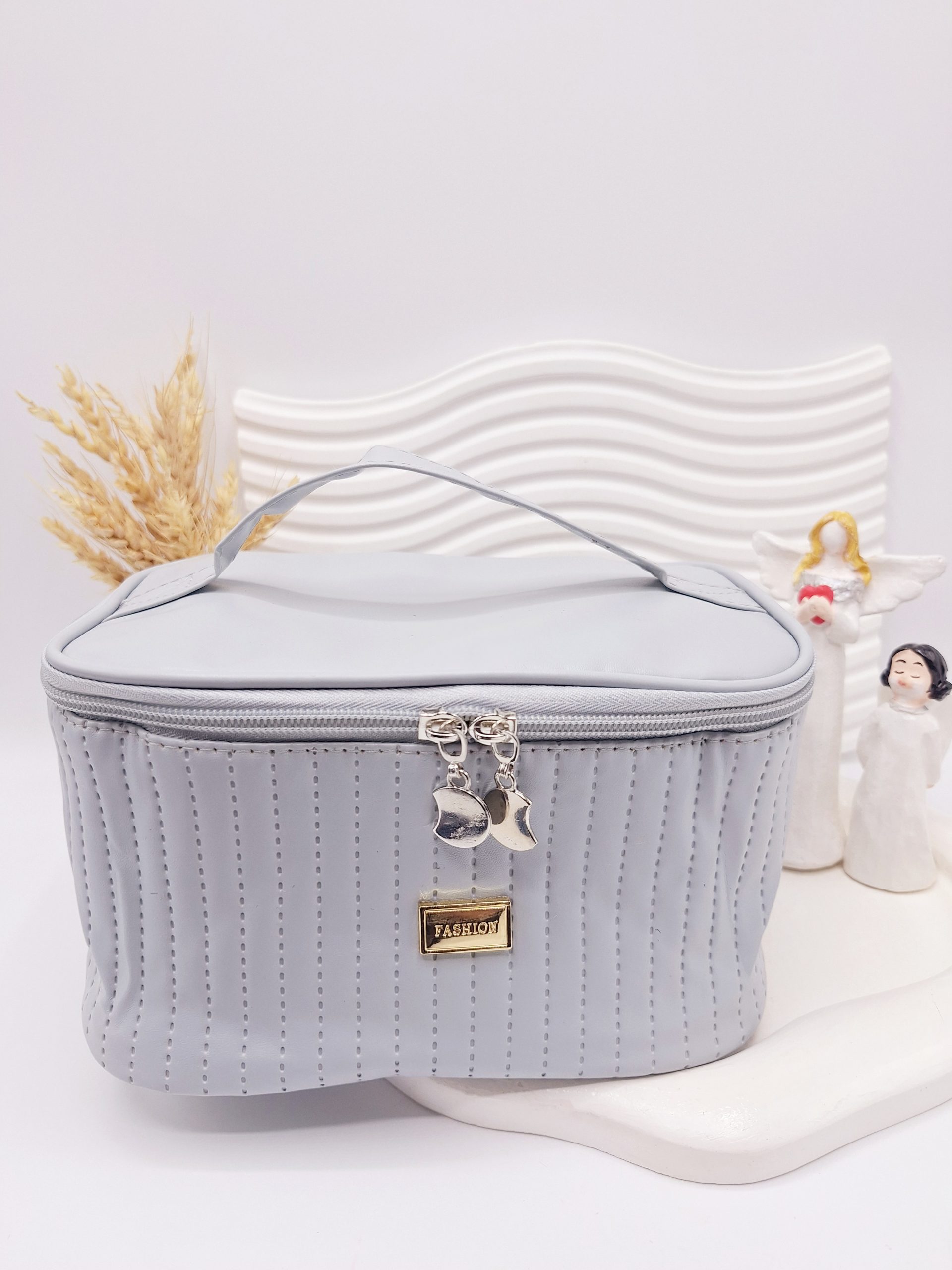 کیف لوازم آرایشی چرمی دوخت شده (رنگ آبی) FASHION