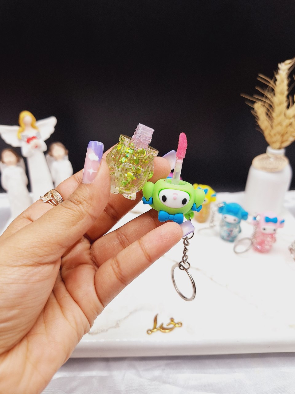 لیپ گلاس طرح فانتزی آویز دار مجیک MAGIC کد LC 1261