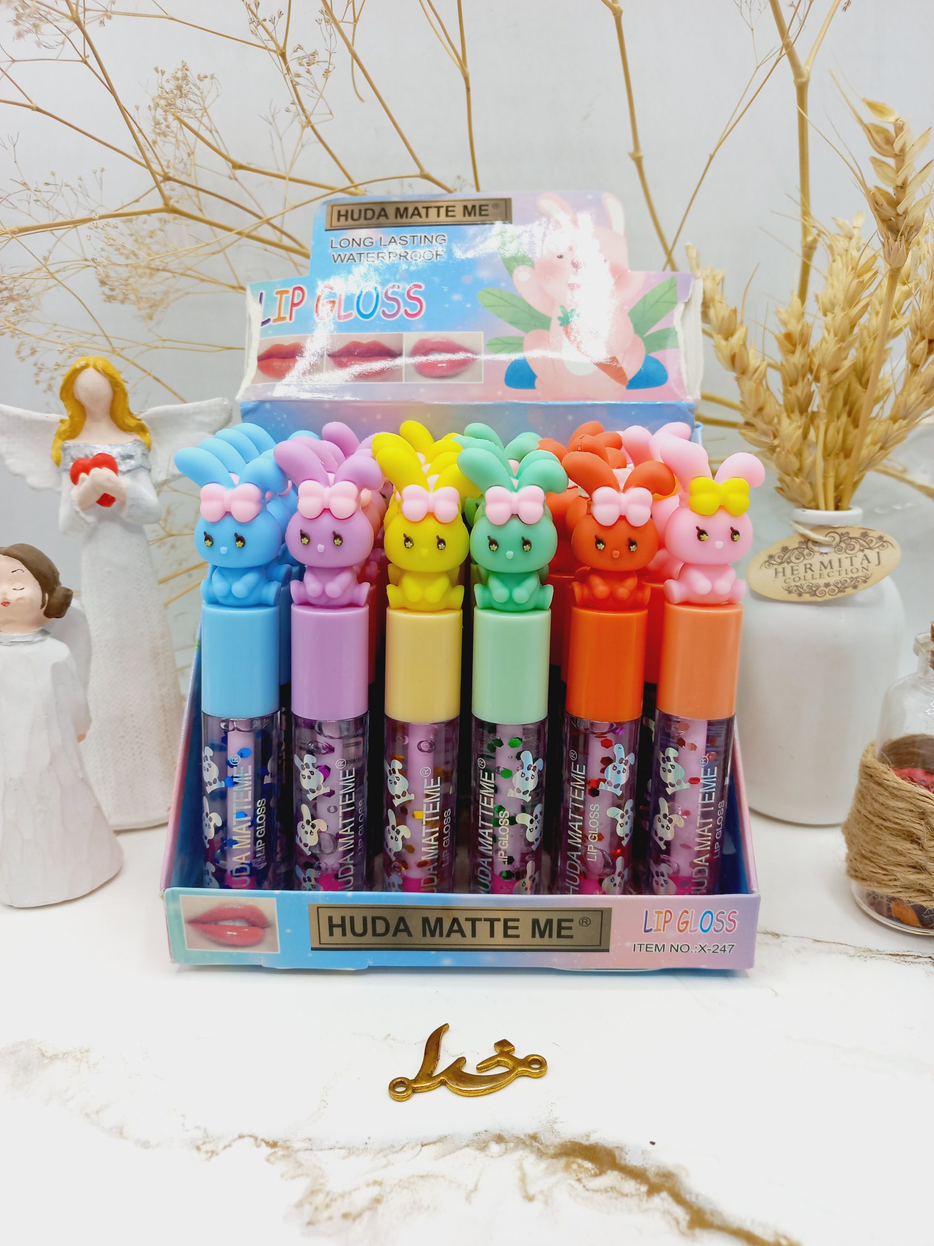 برق لب طرح بچه هدی مات می HUDA Matte Me کد X247