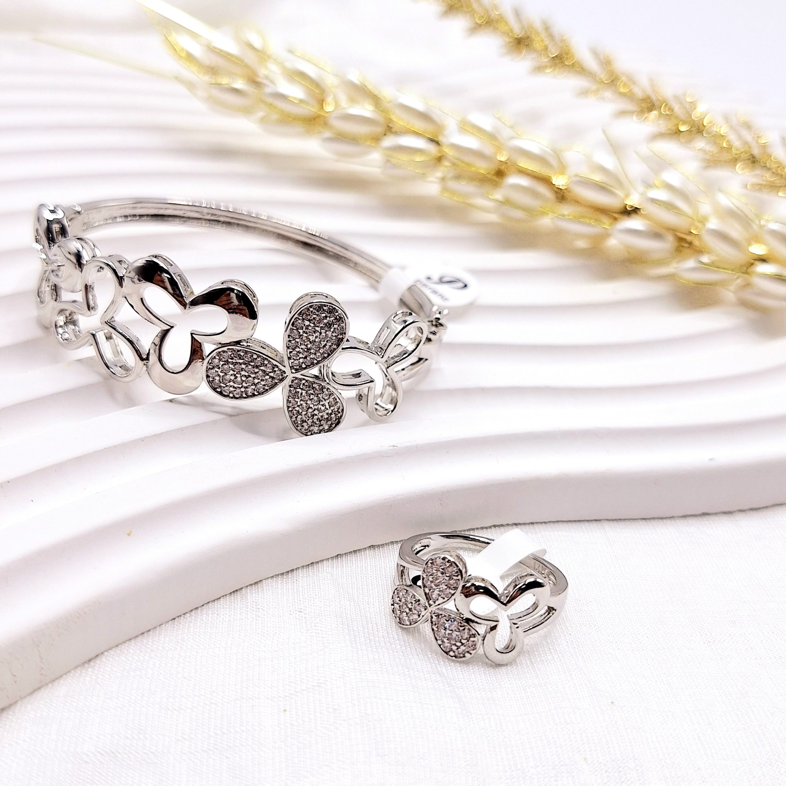 ست انگشتر و دستبند گلبرگ نقره ای استیل