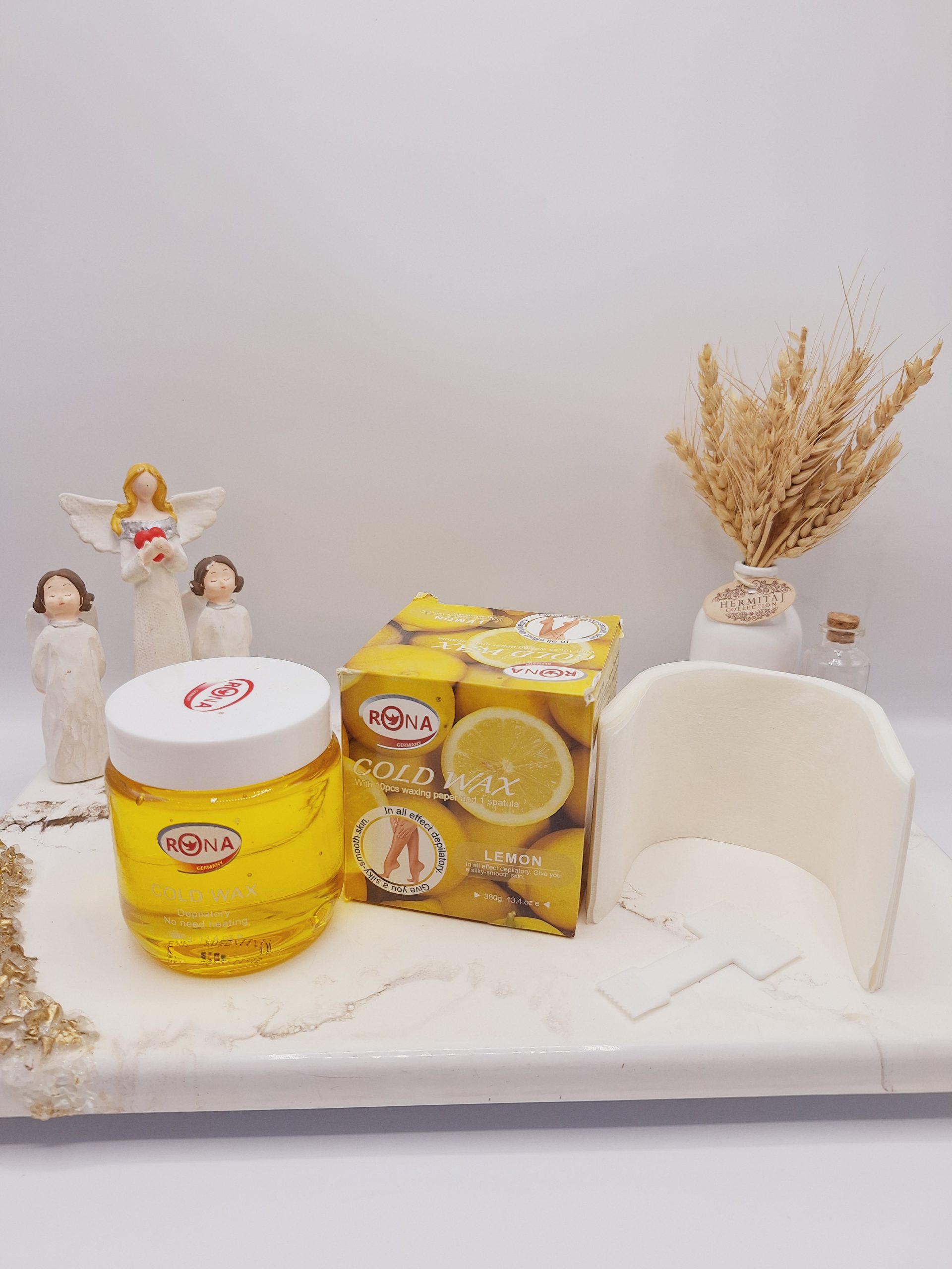 موم سرد با کاغذ اپیلاسیون همراه با کاردک رایحه لیمو برند RONA کد 3152