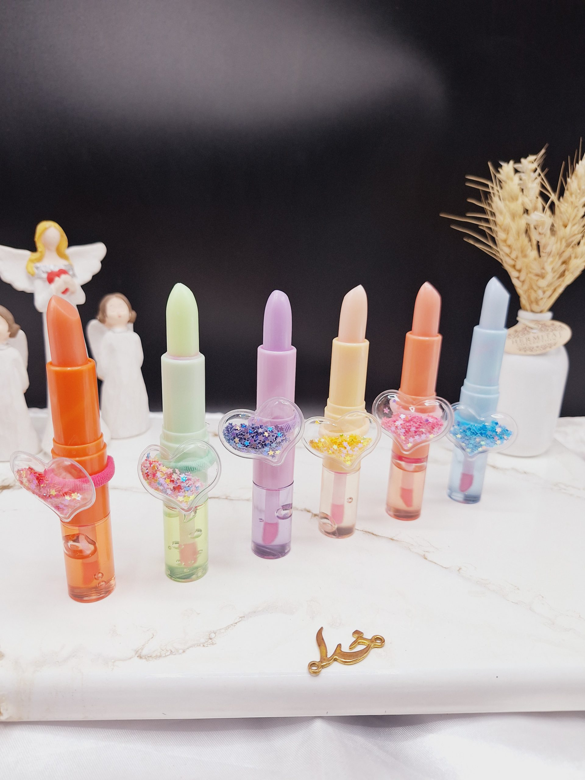 لیپ گلاس و بالم لب همراه با کش مو موکالره Mocallure کد Moc 314