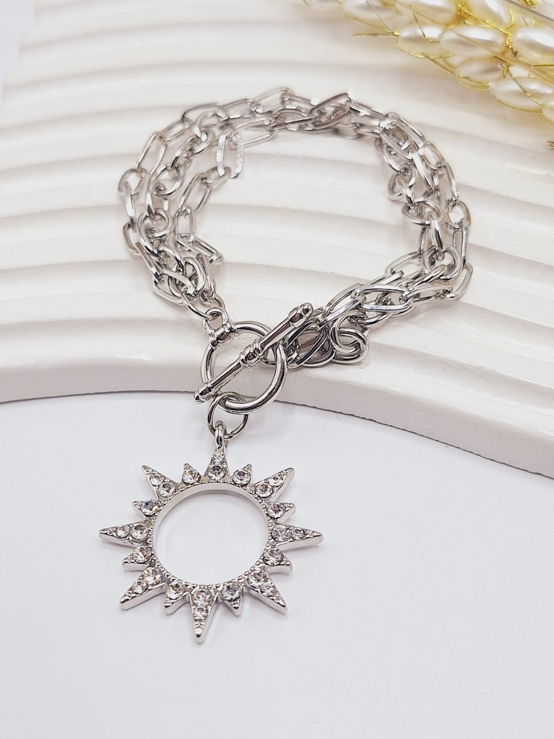 دستبند زنجیری طرح خورشید نقره ای