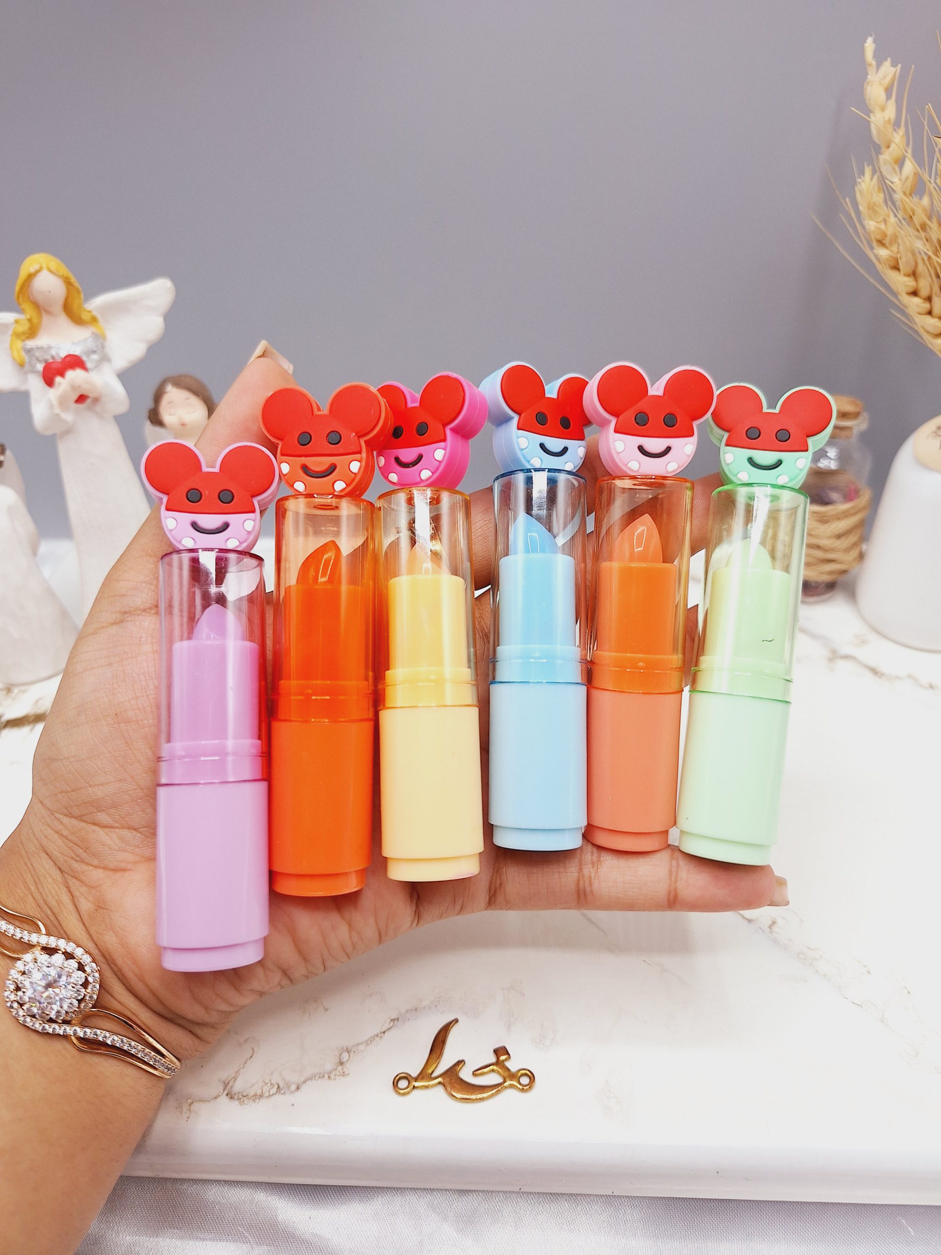 بالم لب خوشبو طرح موش پوکه رنگی برند هدا مات می کد HM_2016