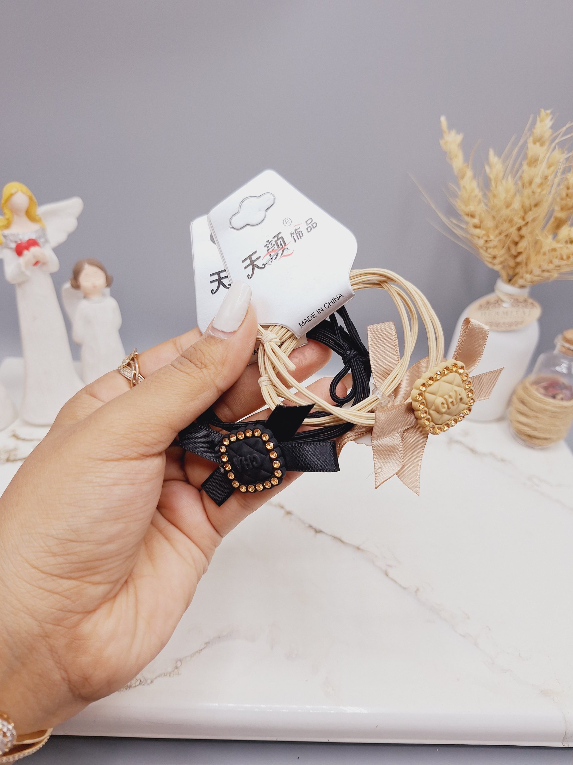 کش مو 2 تایی طرح گل CHA پاپیون دار کد 0012 رندم