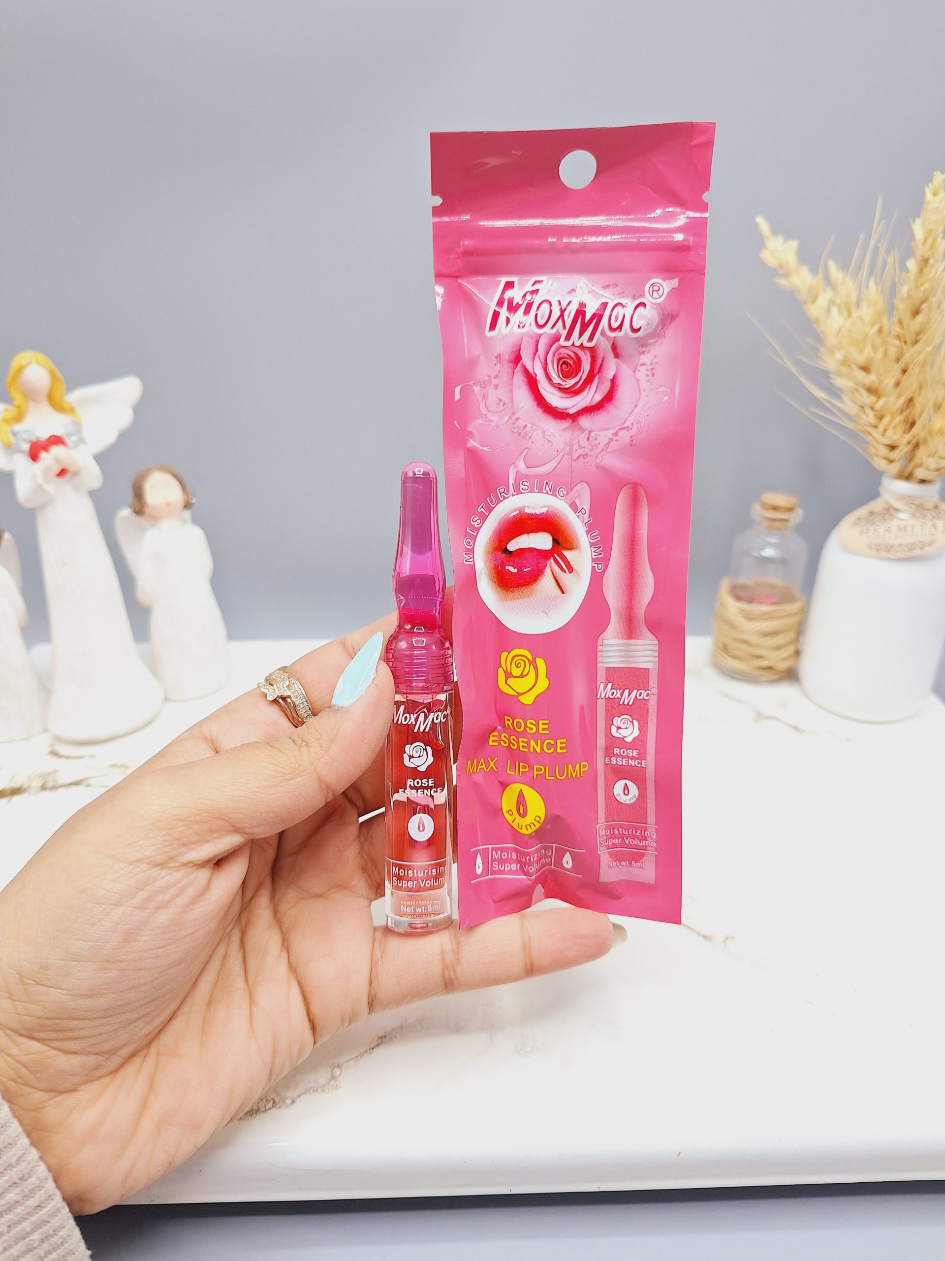 حجم دهنده لب رایحه گل رز کد 1346