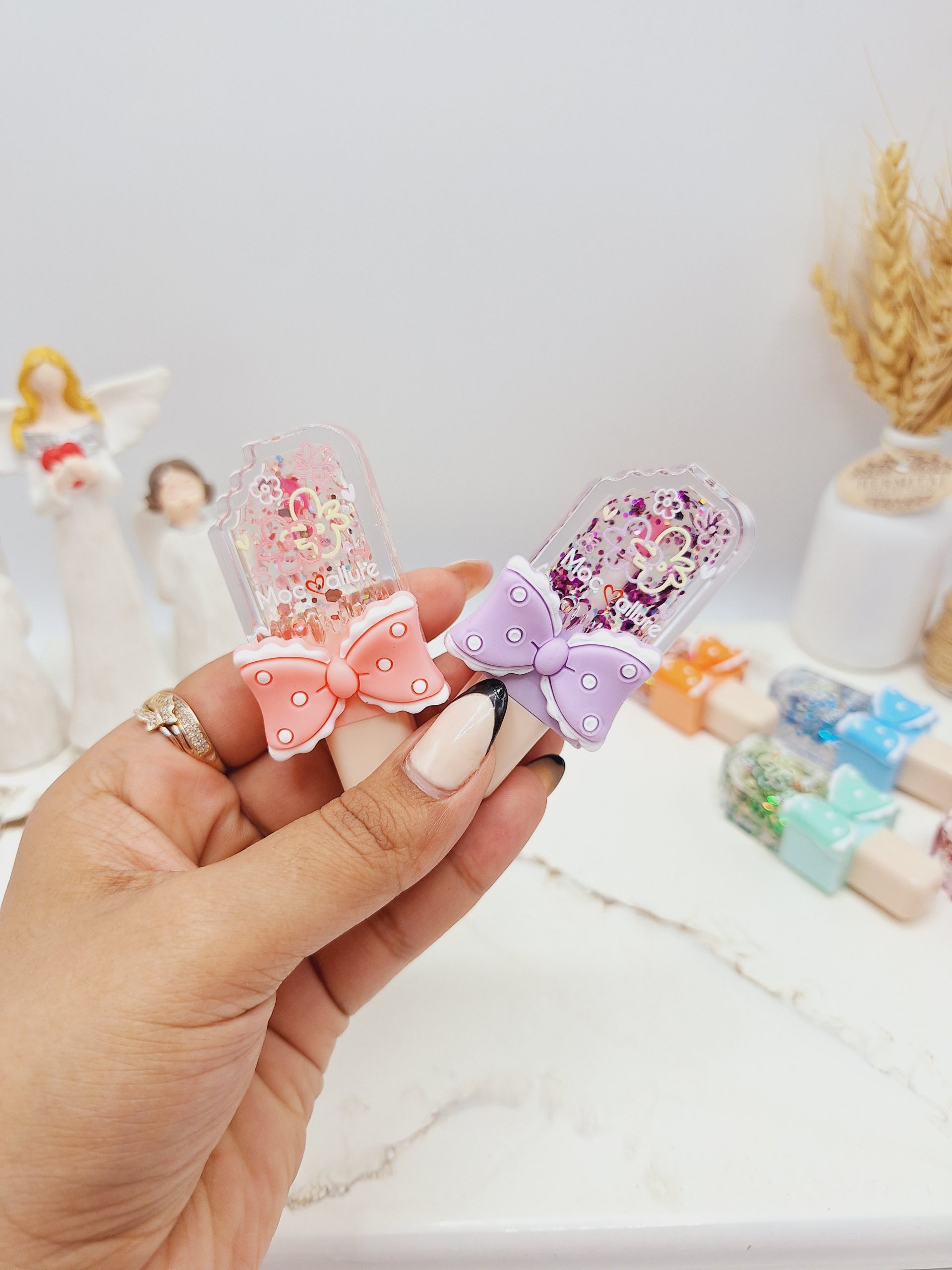 لیپ گلاس شاین دار طرح بستنی پاپیون برند موکالره کد 1082