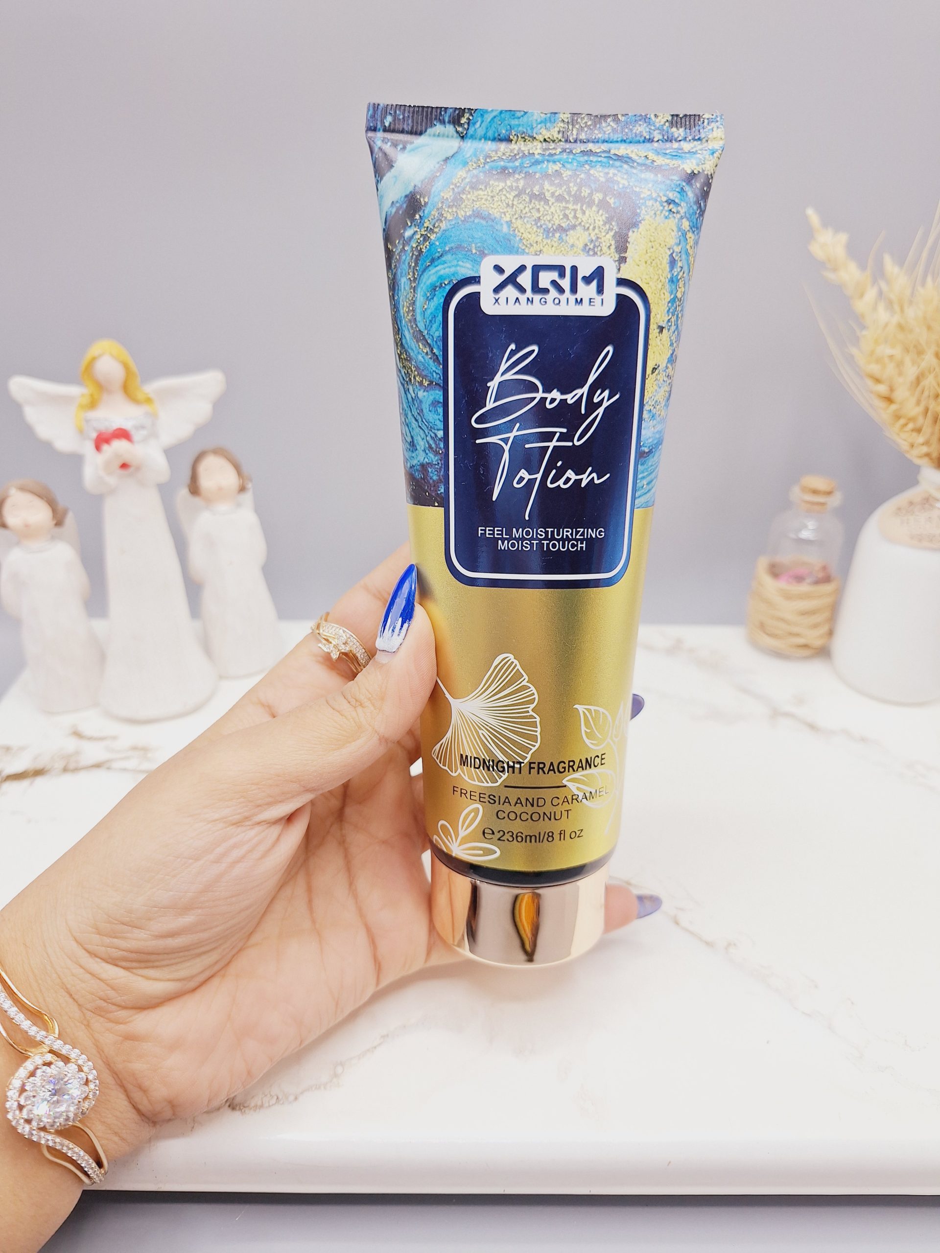 لوسیون بدن XQM حاوی ترکیبات مرطوب کننده و نرم کننده کد 0360