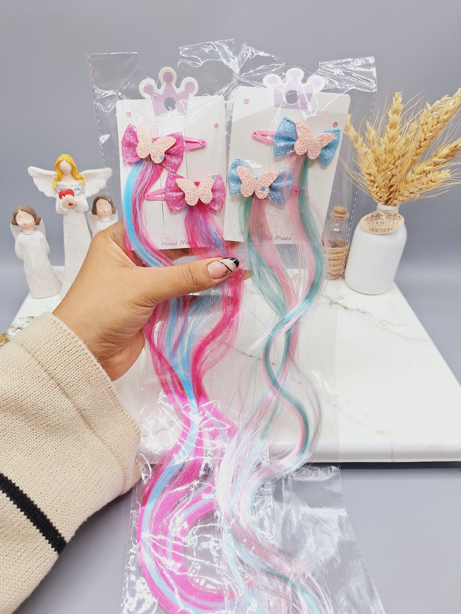 پنس موی دخترانه با موی اکستنشن رنگی طرح پاپیون و پروانه