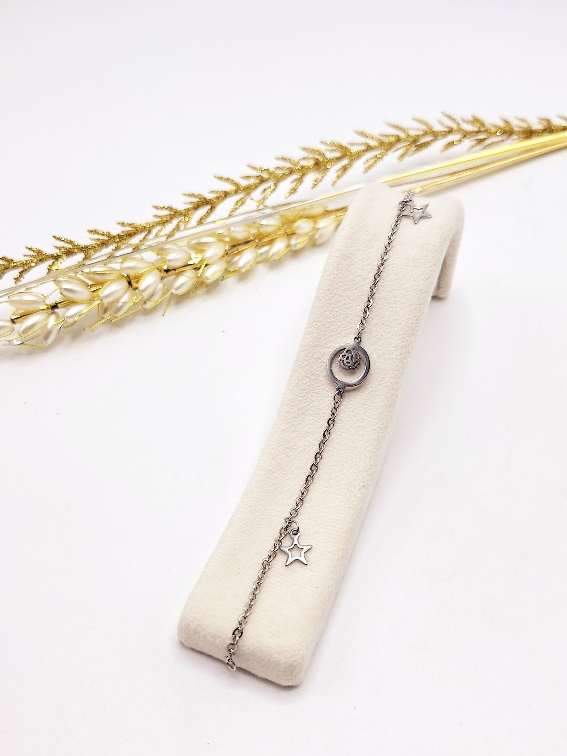 دستبند زنجیری طرح گلبرگ و ستاره استیل