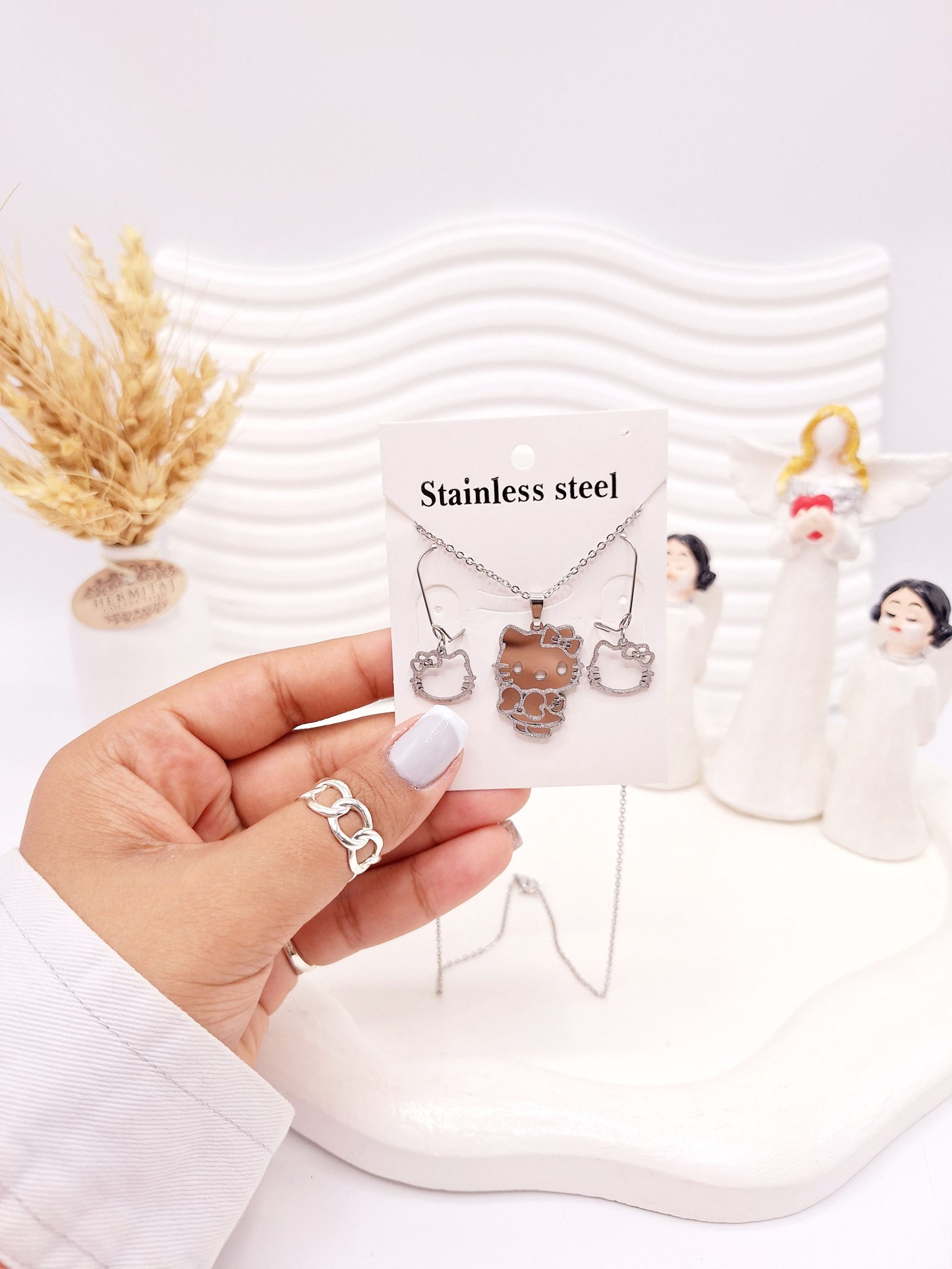 ست گوشواره و گردنبند کیتی نقره ای استیل