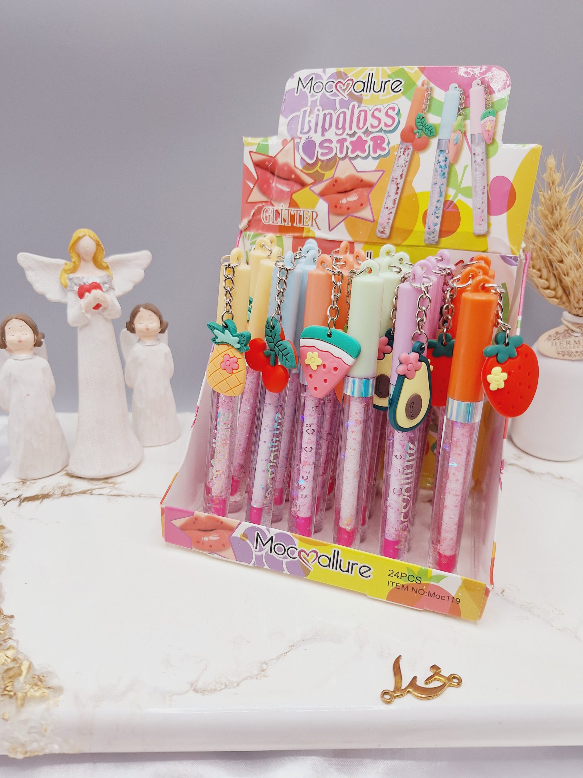 لیپ گلاس گلیتر دار طرح آویز میوه ای برند موکالره