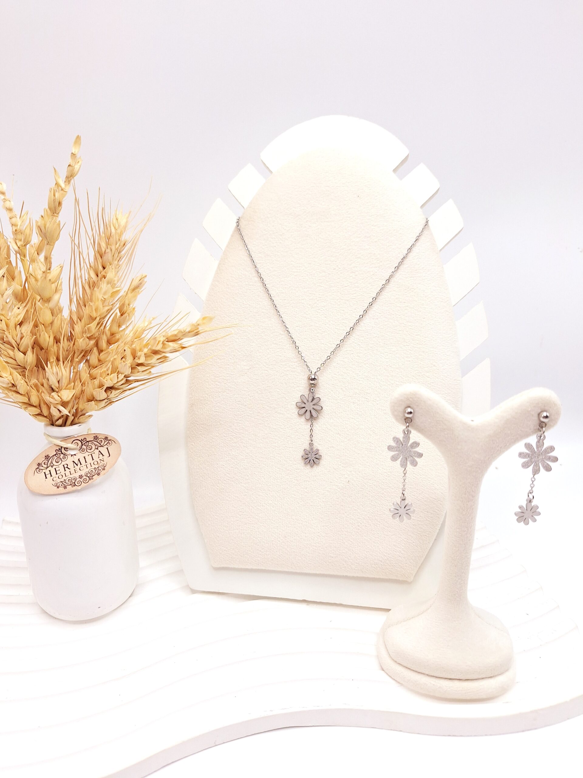 ست گوشواره و گردنبند طرح گل نقره ای استیل