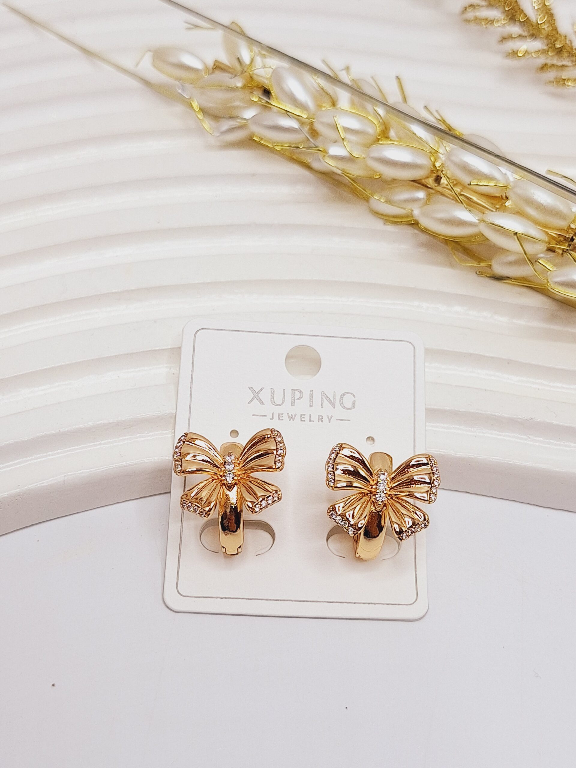 گوشواره قفلی طرح پاپیون نگین دار طلایی ژوپینگ