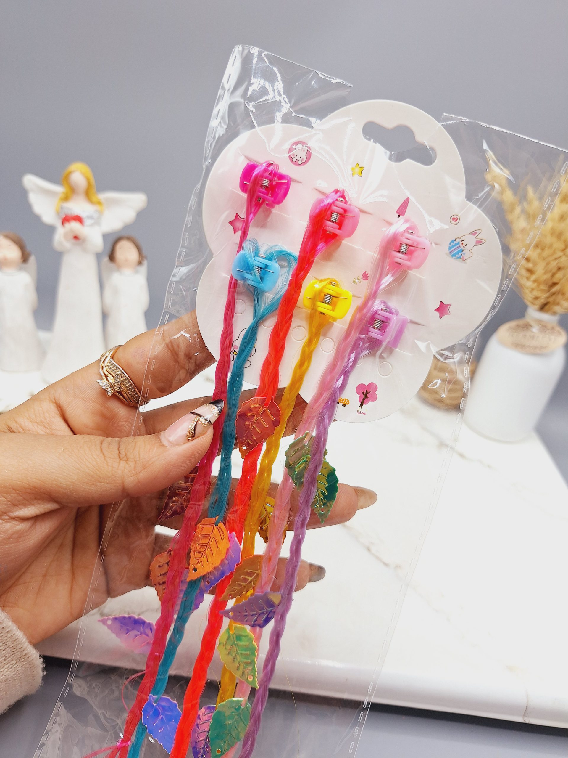 پنس موی دخترانه با موی اکستنشن رنگی طرح بافت و برگ درخت