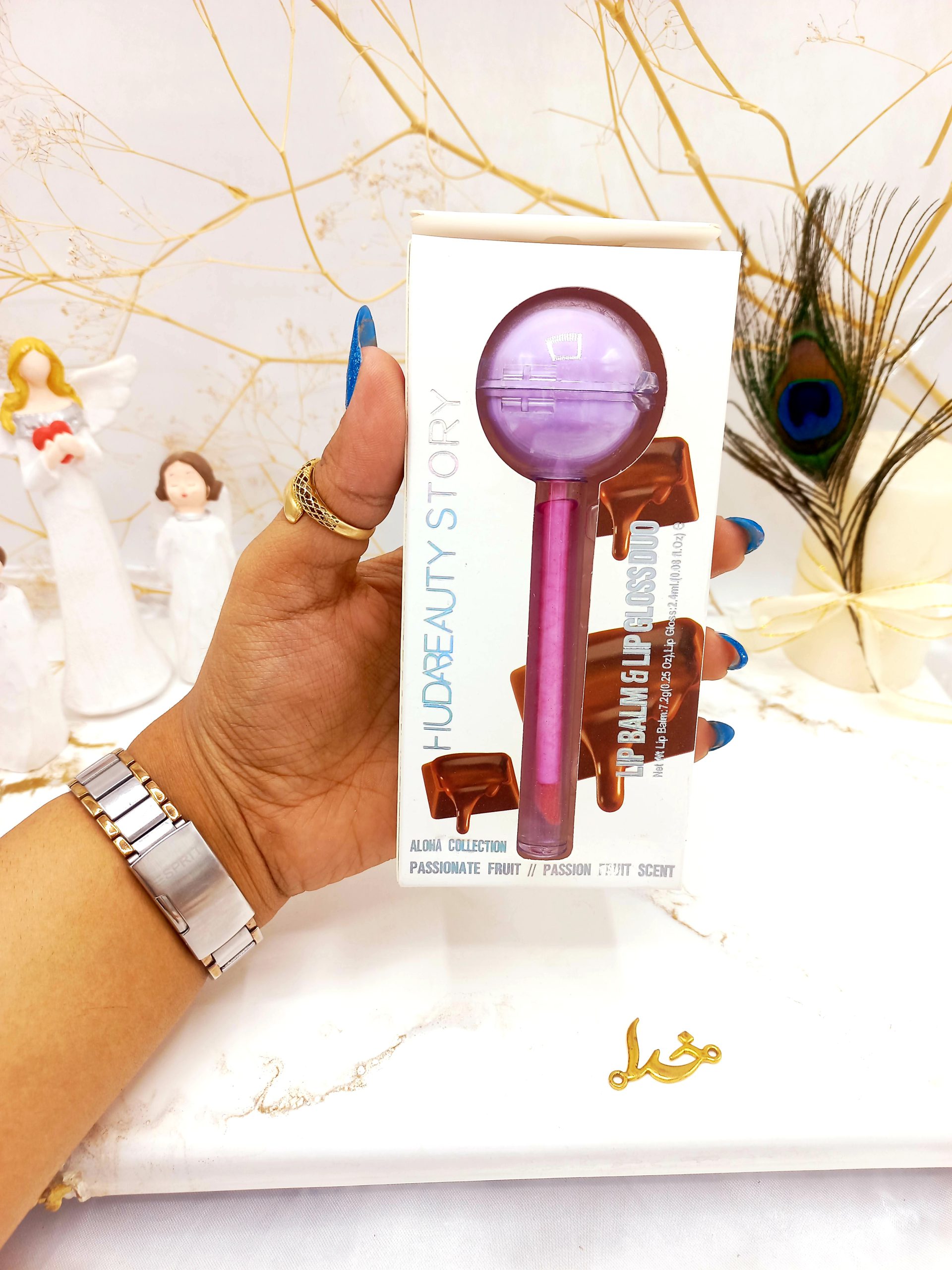 برق لب و بالم لب آبنباتی کاکائو هدا بیوتی استوری HUDA BEAUTY STORY