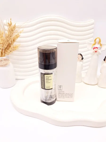 اسنس دوگانه درخشندگی پوست پپتید حلزون برند کوزارکس COSRX کد 452053