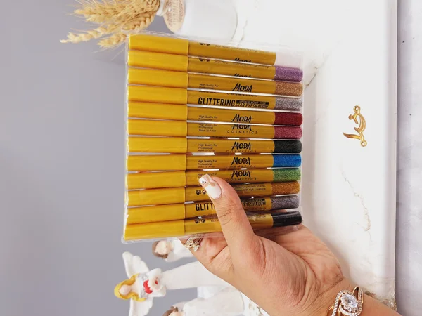 پک 12 تایی مداد چشم گلیتری برند  MODA پوکه طلایی