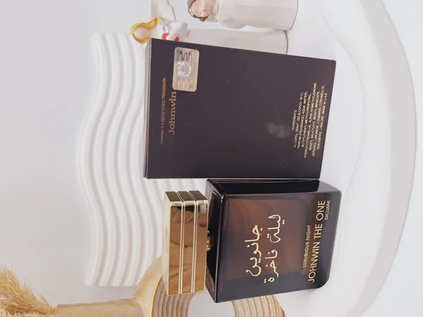 ادکلن 100 میل شرکتی ماندگاری 8 ساعته مدل جانوین لیلة فاخرة کد 0571