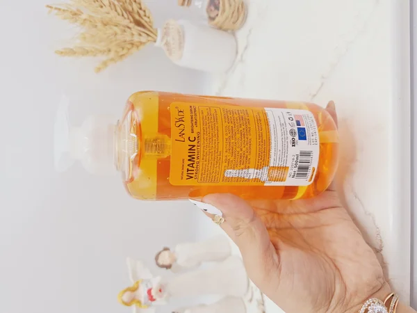 سرم رفع تیرگی و ضد لک قوی تمام بدن  VITAMIN C در 3 روز برند لنسیاد حجم 500 میل کد 6822 ( رنگ نارنجی)