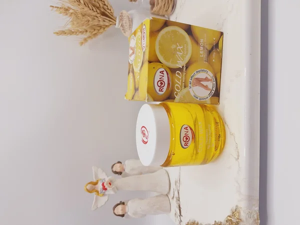 موم سرد با کاغذ اپیلاسیون همراه با کاردک رایحه لیمو برند RONA کد 3152