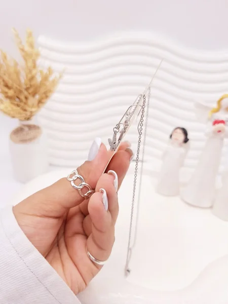 ست گوشواره و گردنبند طرح پروانه مخرج کاری نقره ای استیل