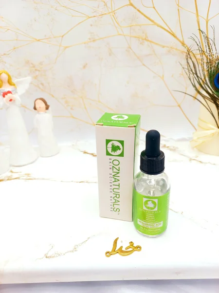 سرم مراقبتی ویتامین سی و هیالورونیک اسید OZNATURALS