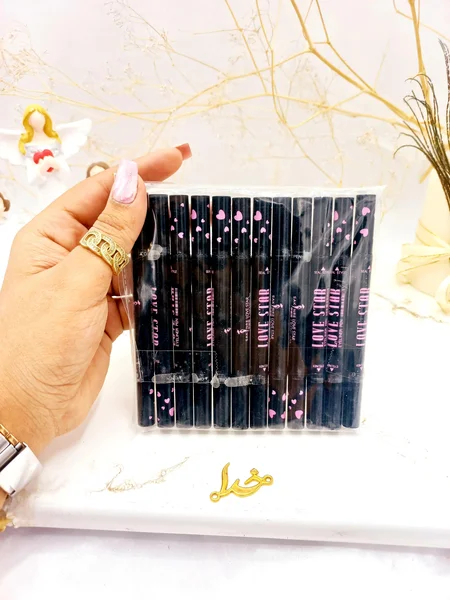 خط چشم مشکی ماژیکی و دوسر طرح دار ستاره ای LOVE STAR ( پوکه بنفش )
