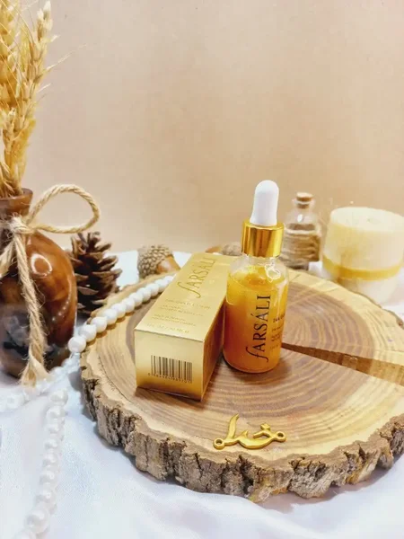 پرایمر و سرم صورت طلایی فارسالی farsali مدل 24K GOLD ELIXIR