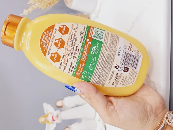 شامپو ترمیم کننده گیاهی و درمانی گنجینه های عسل برند گارنیر اصلی حجم 400 میل کد 1948