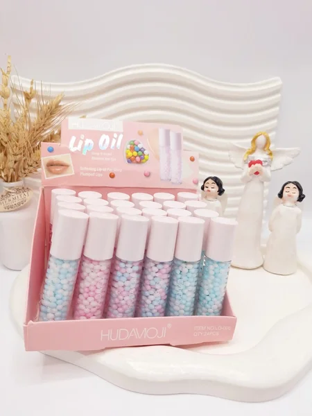 برق لب و مرطوب کننده لب مارشمالو برند HUDAMOJI کد LO-006