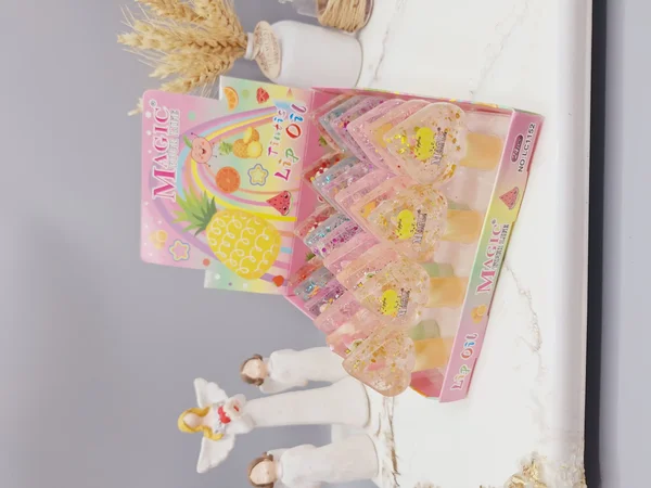 لیپ گلاس شاین دار طرح طرح قلب مدل آناناسی برند MAGIC کد 1152