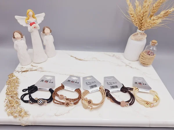 کش مو 2 تایی طرح گل قلبی مراورید دار کد 0012 رندم