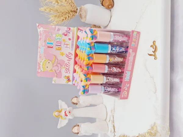 لیپ گلاس گلیتری طرح پروانه هولد مورنینگ Hold morning کد HL5417