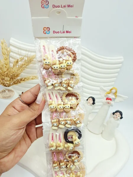 ست 12 تایی کش و پنس مو دخترانه کرومی رنگ کرم